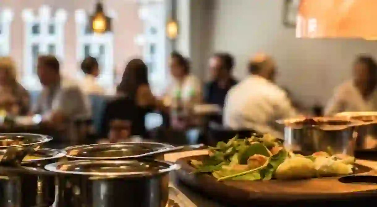 People dining at an Indian restaurant