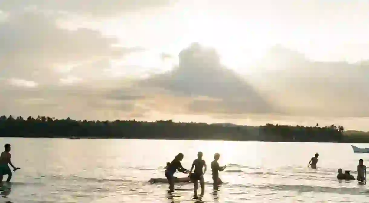 Sunset Surfing at Cloud 9 beach, Siargao, Philippines