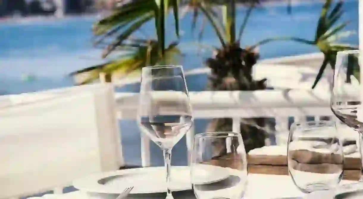 The beachfront terrace at Hotel Muva Beach.