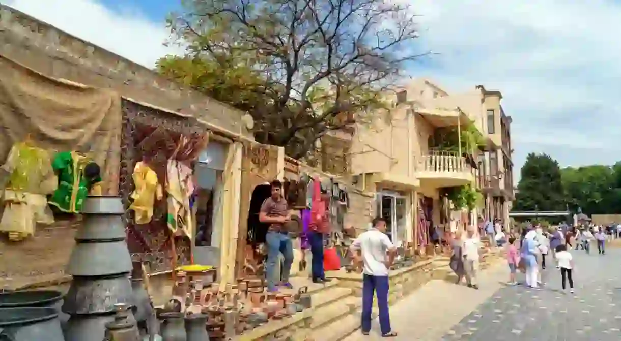 Tourists and sellers in Icheri Sheher