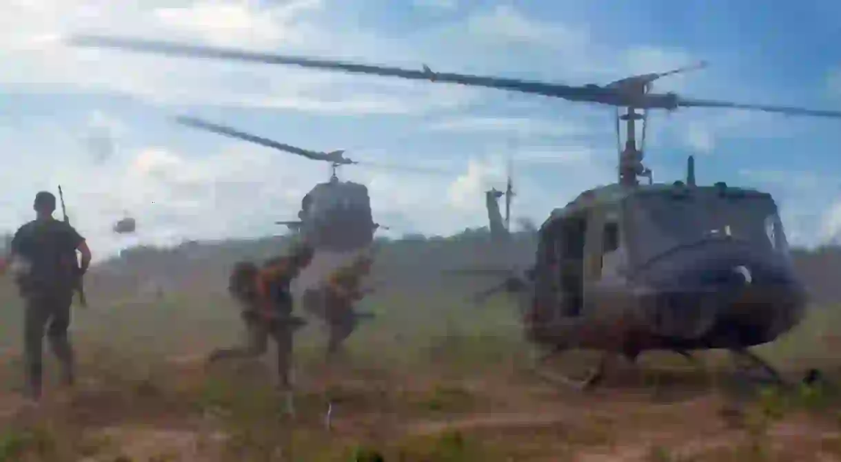 American Huey helicopters evacuating troops