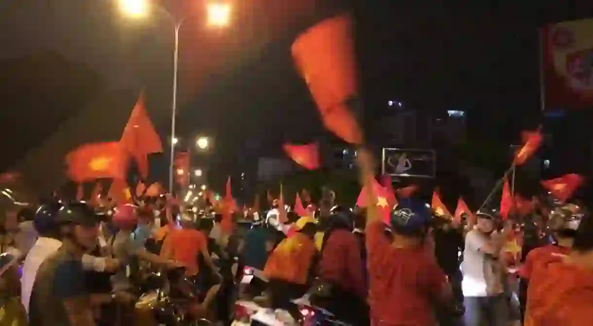 Vietnamese flags flying proudly