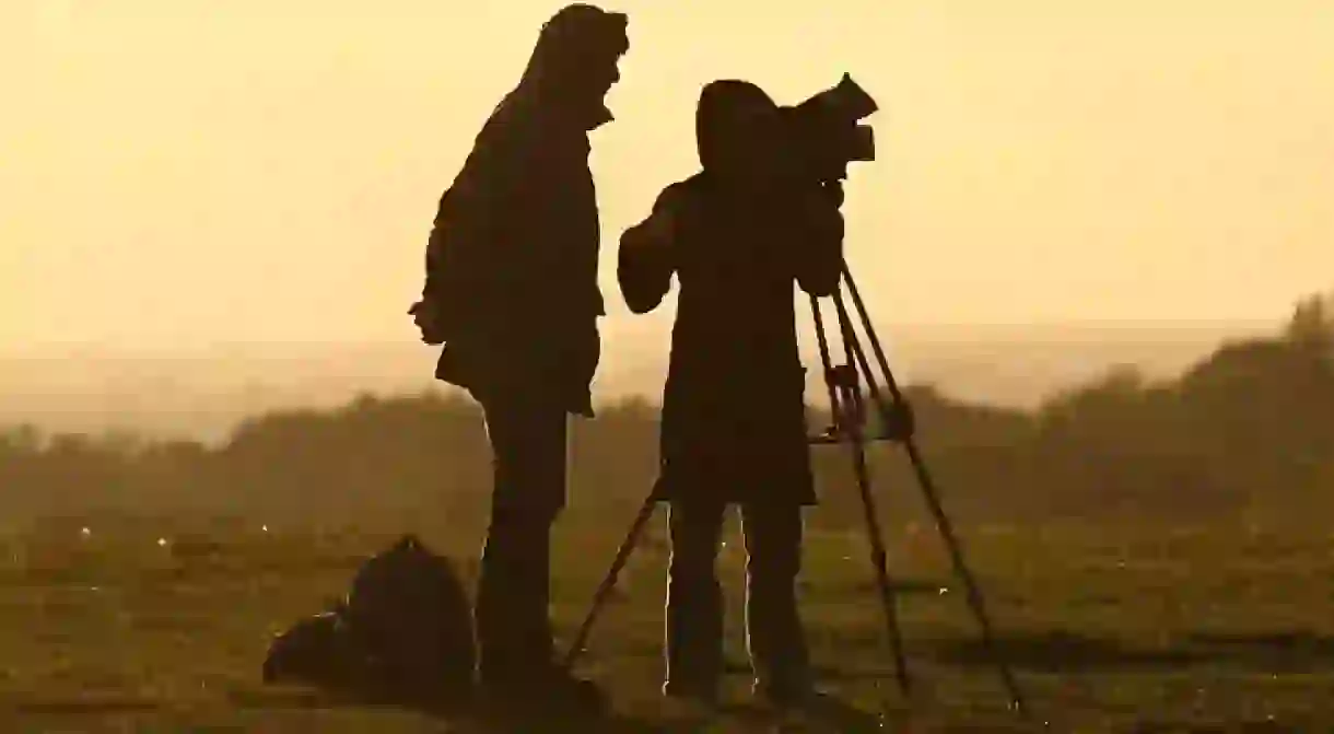 Film crew at sunset