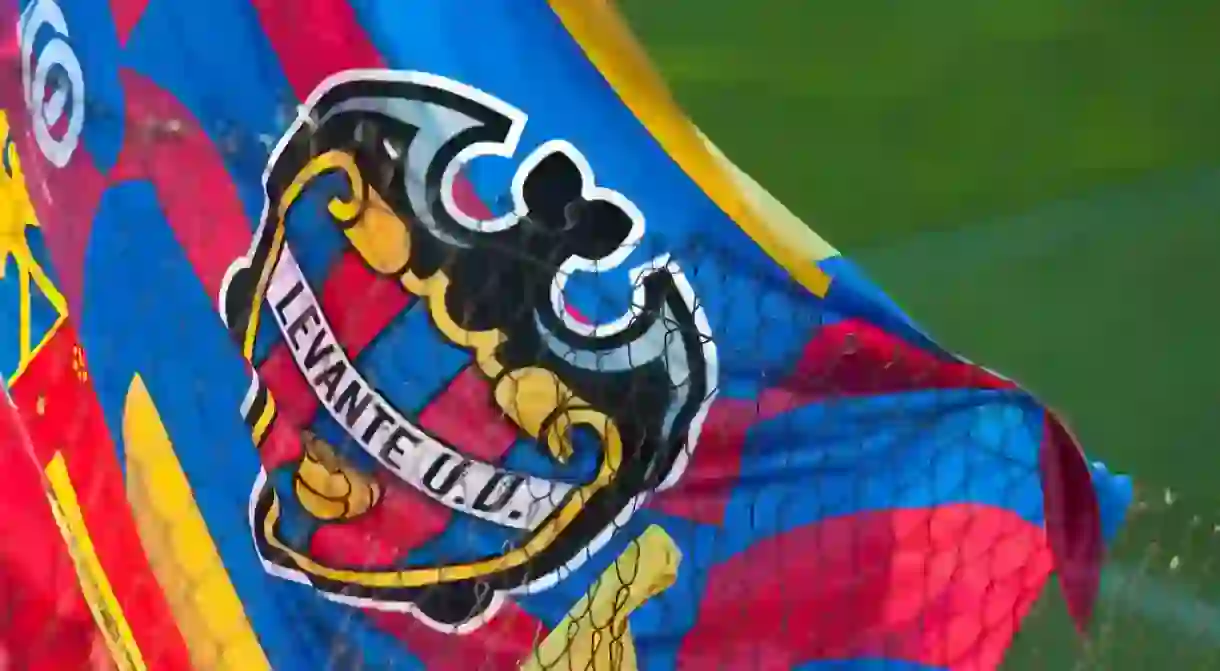 The flag of Levante UD, featuring the bat, one of the symbols of Valencia