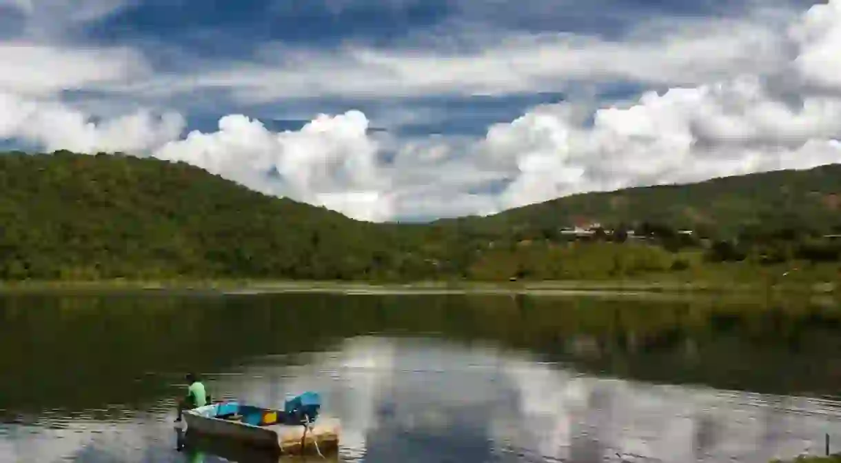 A lone boat on Rih Lake in Chin State, Myanmar