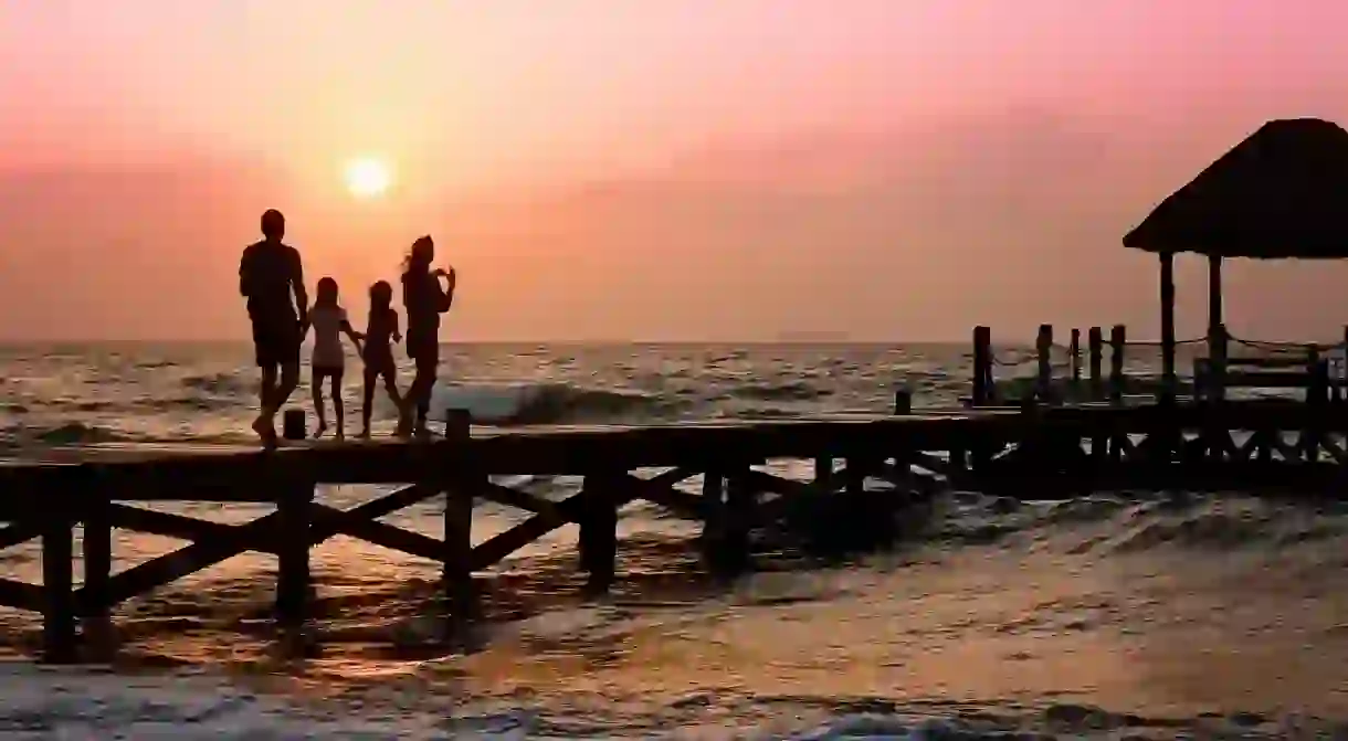 Family Walking on Pier