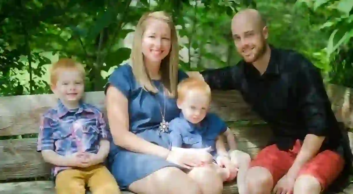 Family sitting on a bench