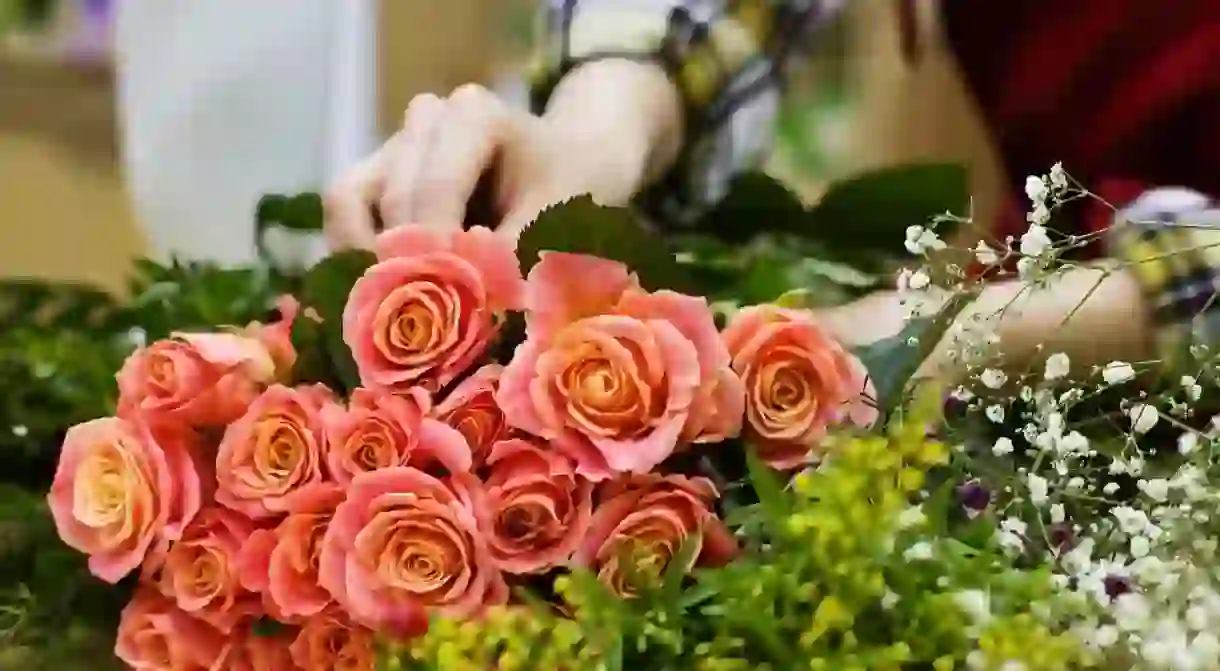 Florist Arranging a Bouquet