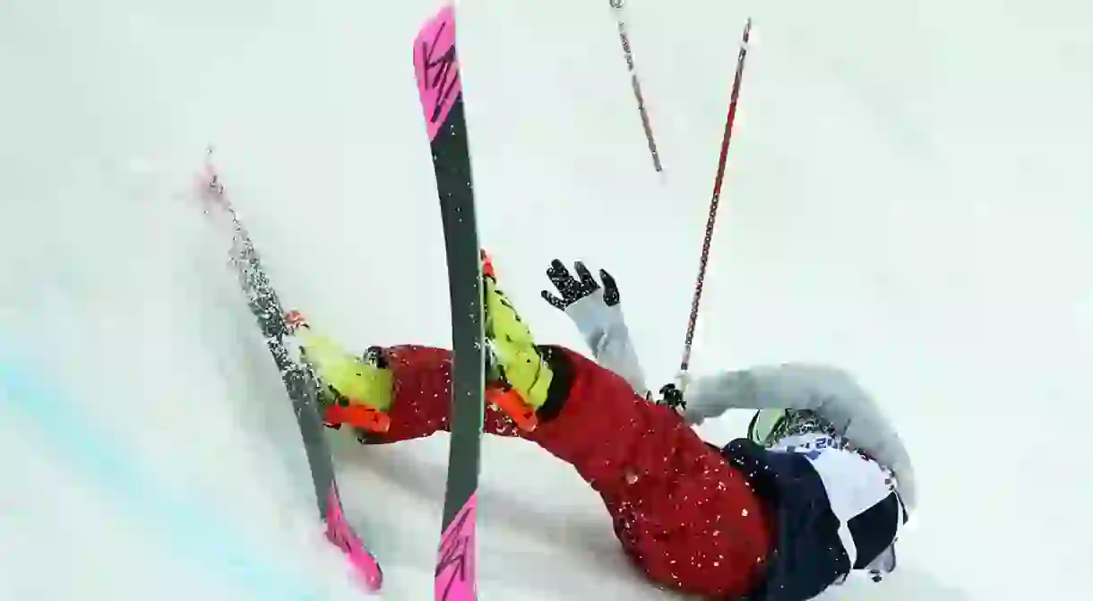 Brita Sigourney of the United States crashes during the womens ski halfpipe final at the 2014 Winter Olympics in Sochi, Russia