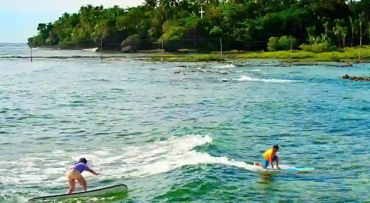 Surfers in Siargao