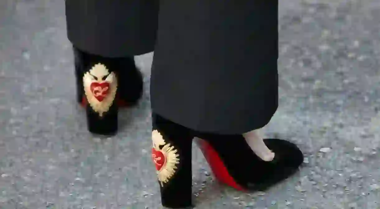 Black velvet Louboutin heels spotted during Milan Fashion Week 2017