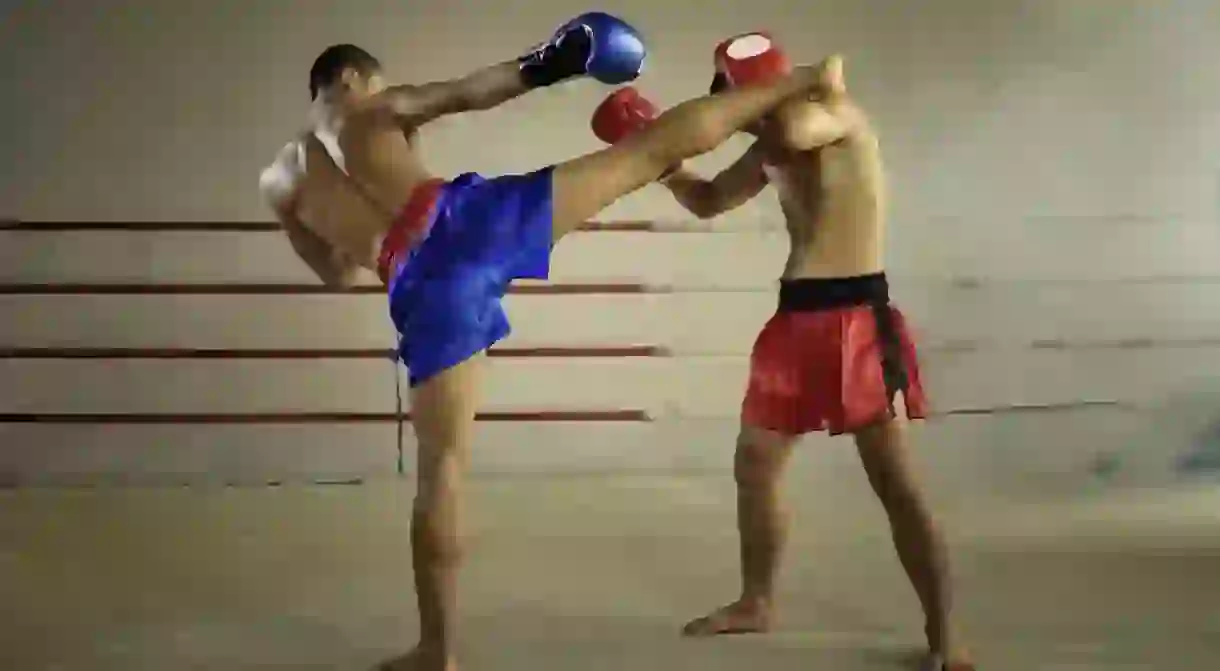 Muay Thai fighters practicing their techniques