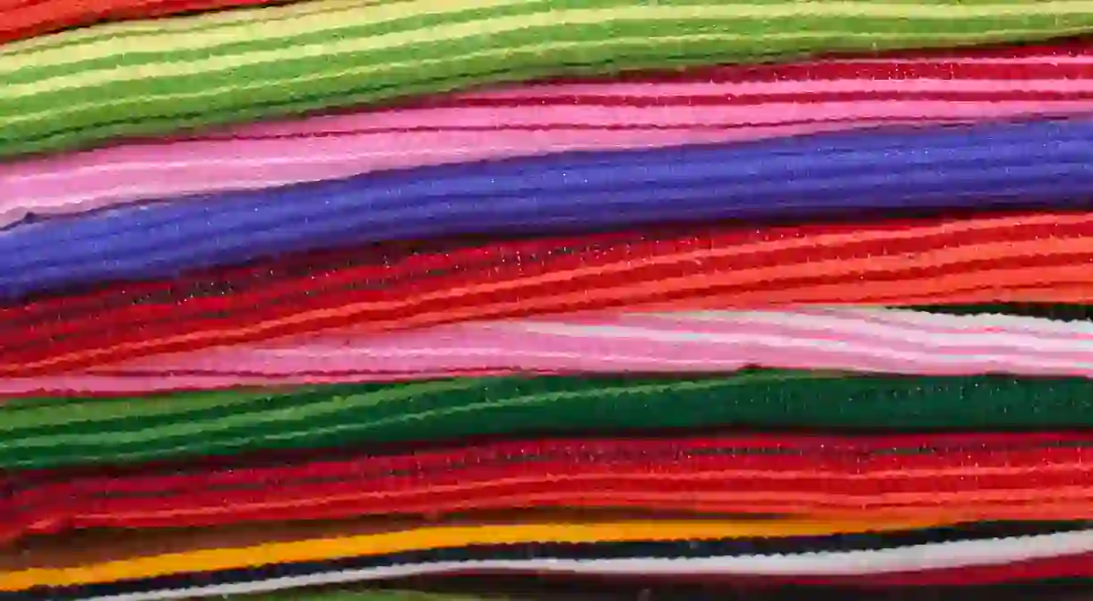 Colorful textiles on sale in a Mexican market