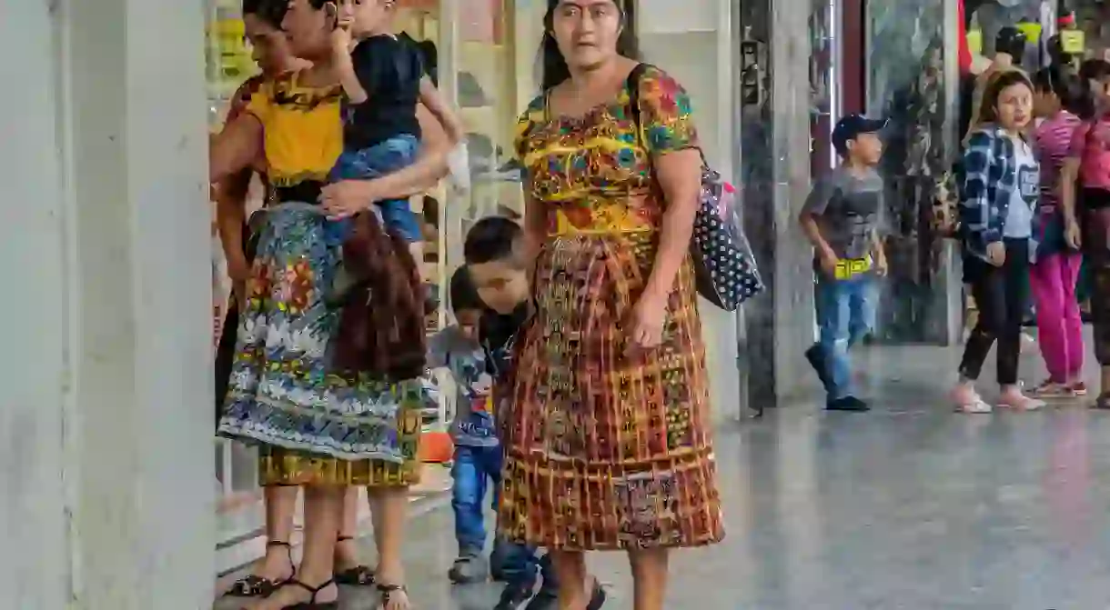 Traditional Mayan dress is a common sight in Guatemala City