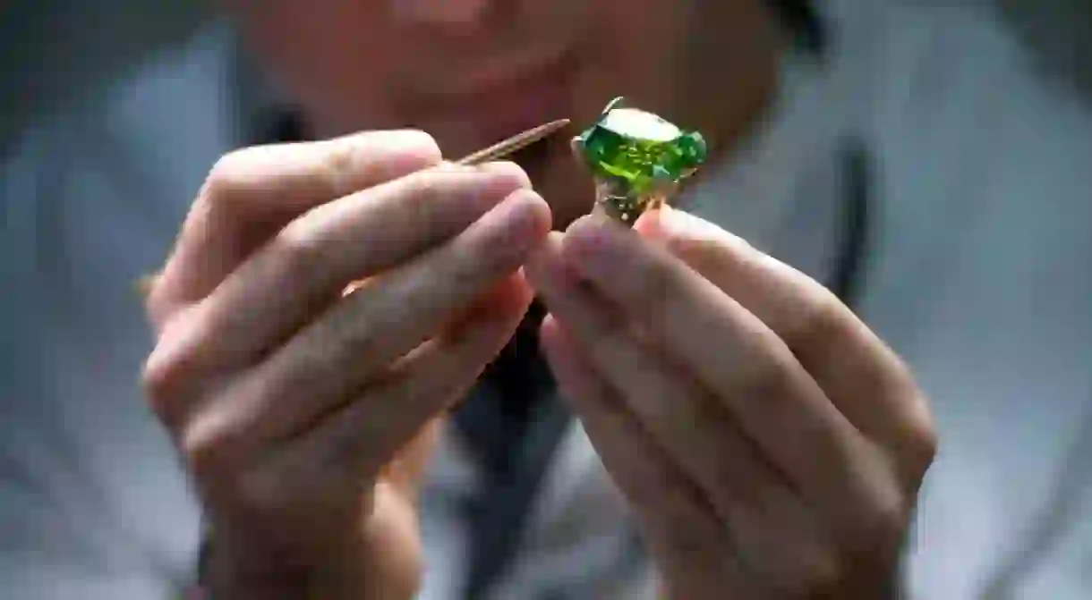 A jeweller working on a diamond ring.