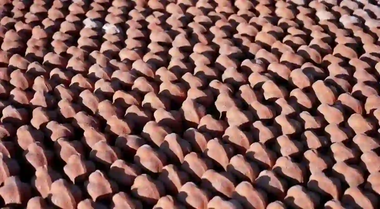 The art installation in Ypres features 600,000 small clay figures.