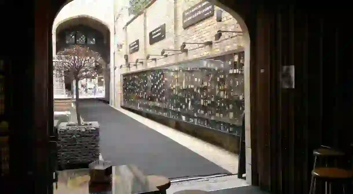 Cafe 2be in Bruges is known for its Beer Wall featuring hundreds of different types of beer