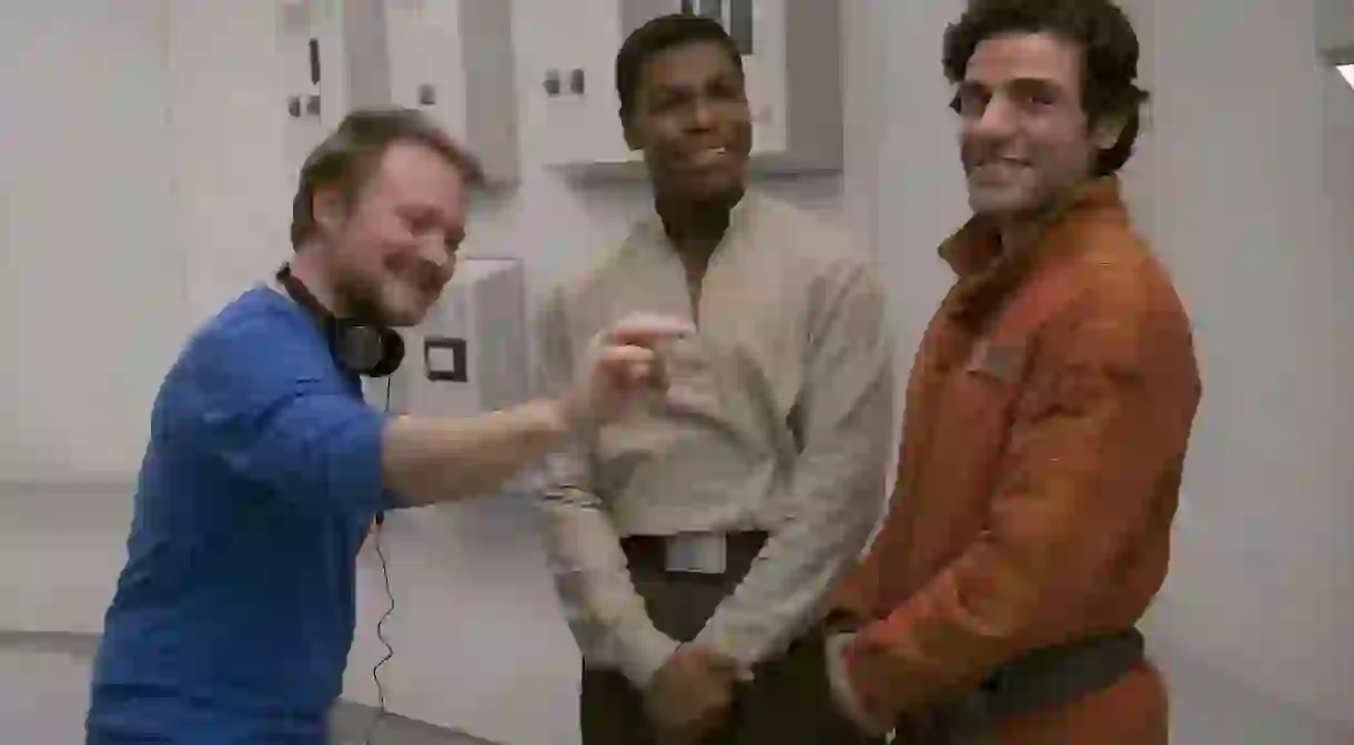 Star Wars: The Last Jedi: Director Rian Johnson on set with John Boyega (Finn) and Oscar Isaac (Poe Dameron).