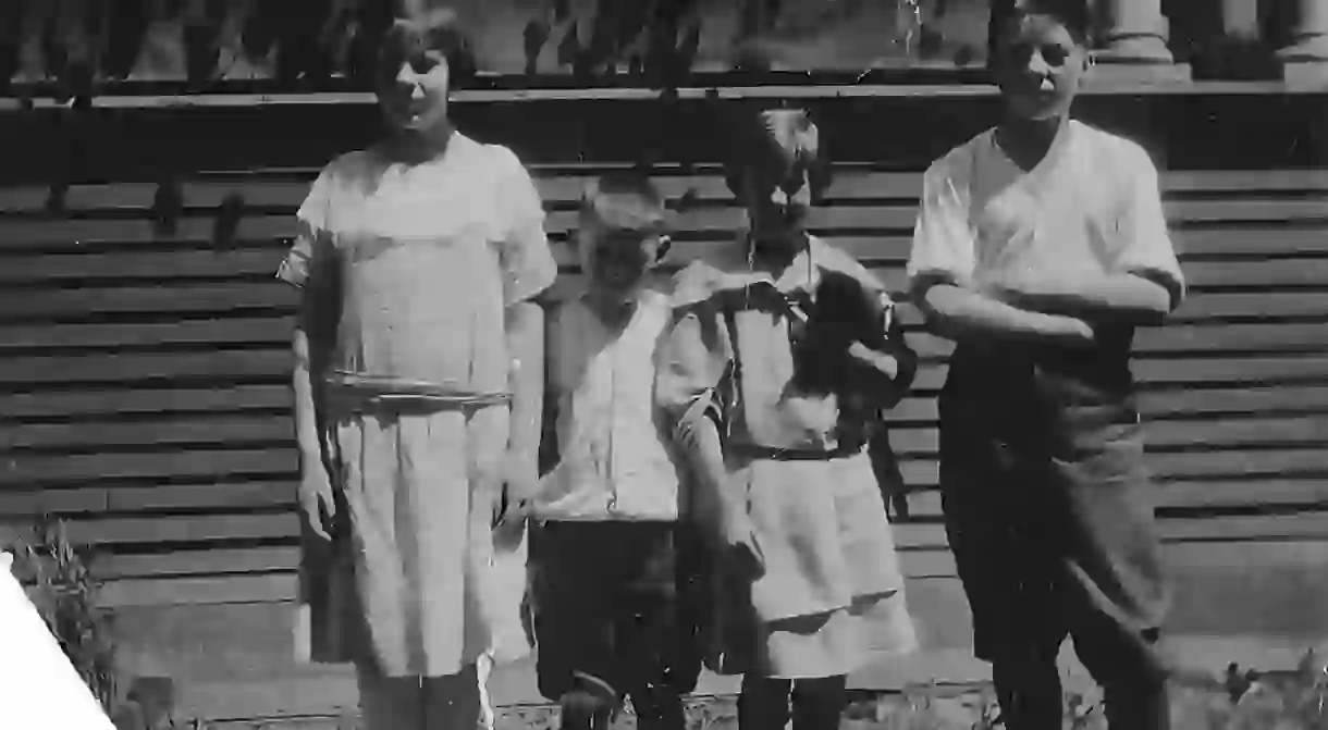 Schaffner Agnes Martin siblings photo. (L to R: Maribel, Malcom Jr., Agnes with cat, Ronald). Courtesy of Christa Martin, Martin Family Archive