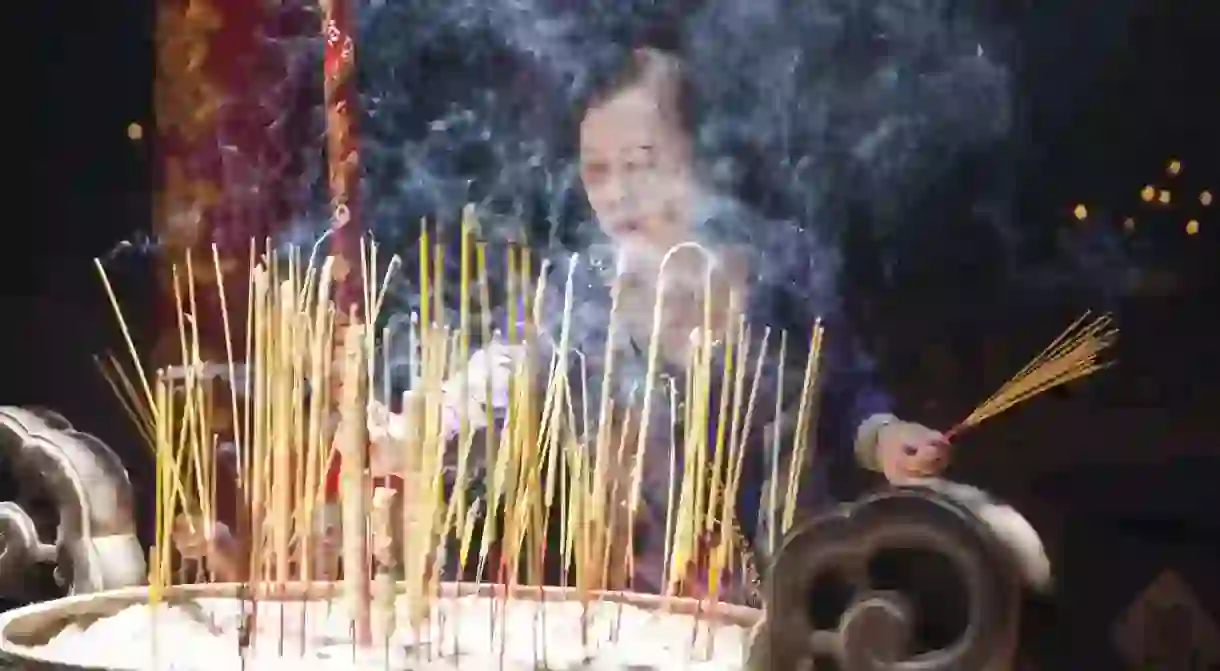 Burning incense in a Chinatown pagoda