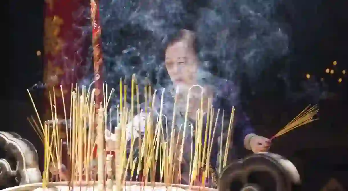 Burning incense in a Chinatown pagoda