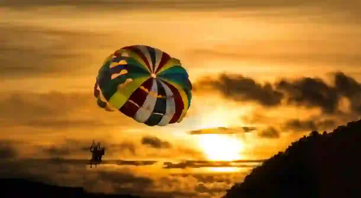 Enjoy the the magnificent sunset while parachuting in Langkawi