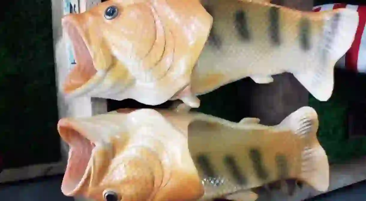 Bizarre fish slippers with gaping mouths