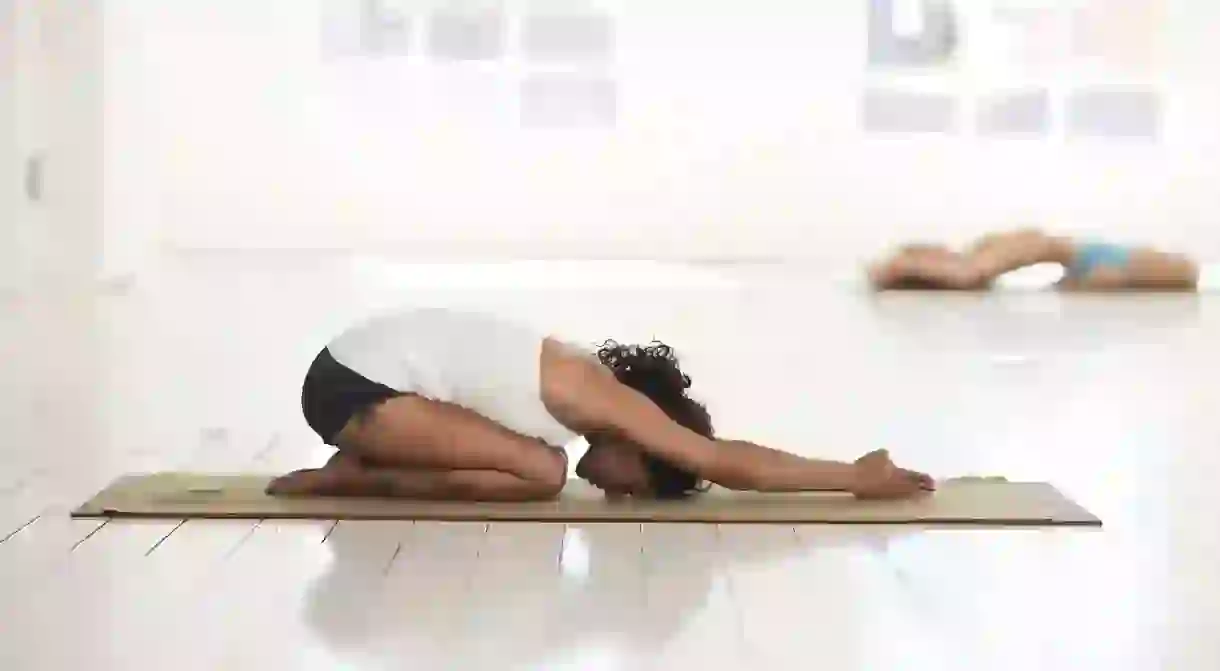 Balasana, or childs pose, releases tension in the chest, back and shoulders