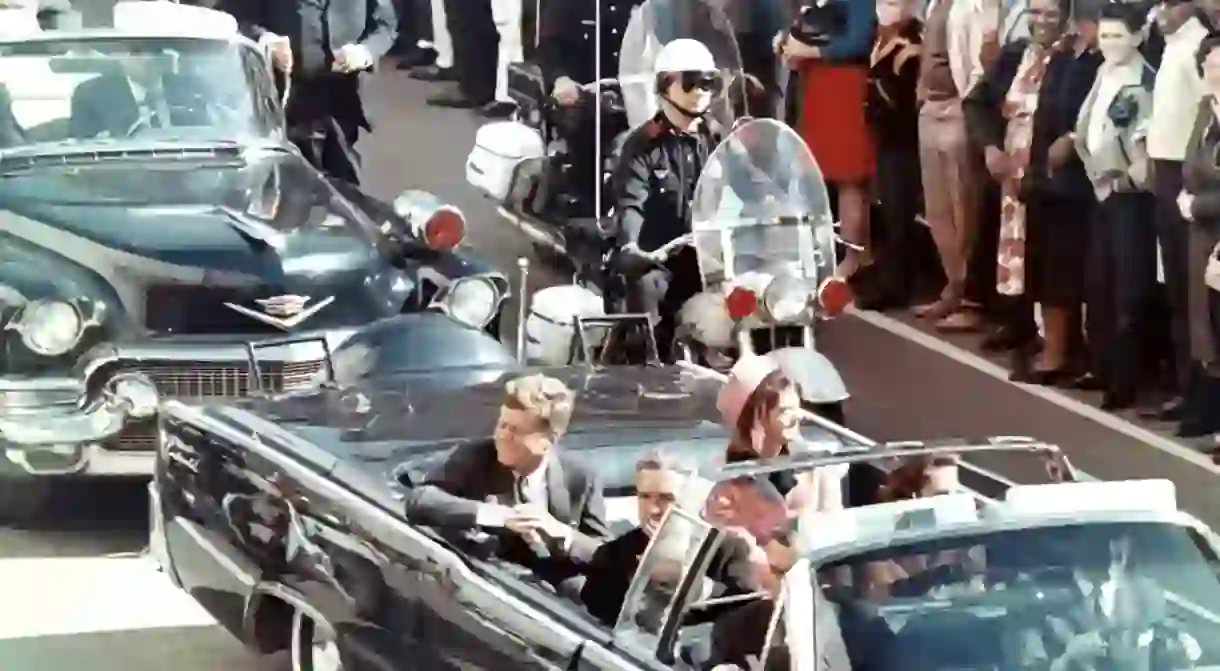 John F. Kennedy in his motorcade minutes before his assassination