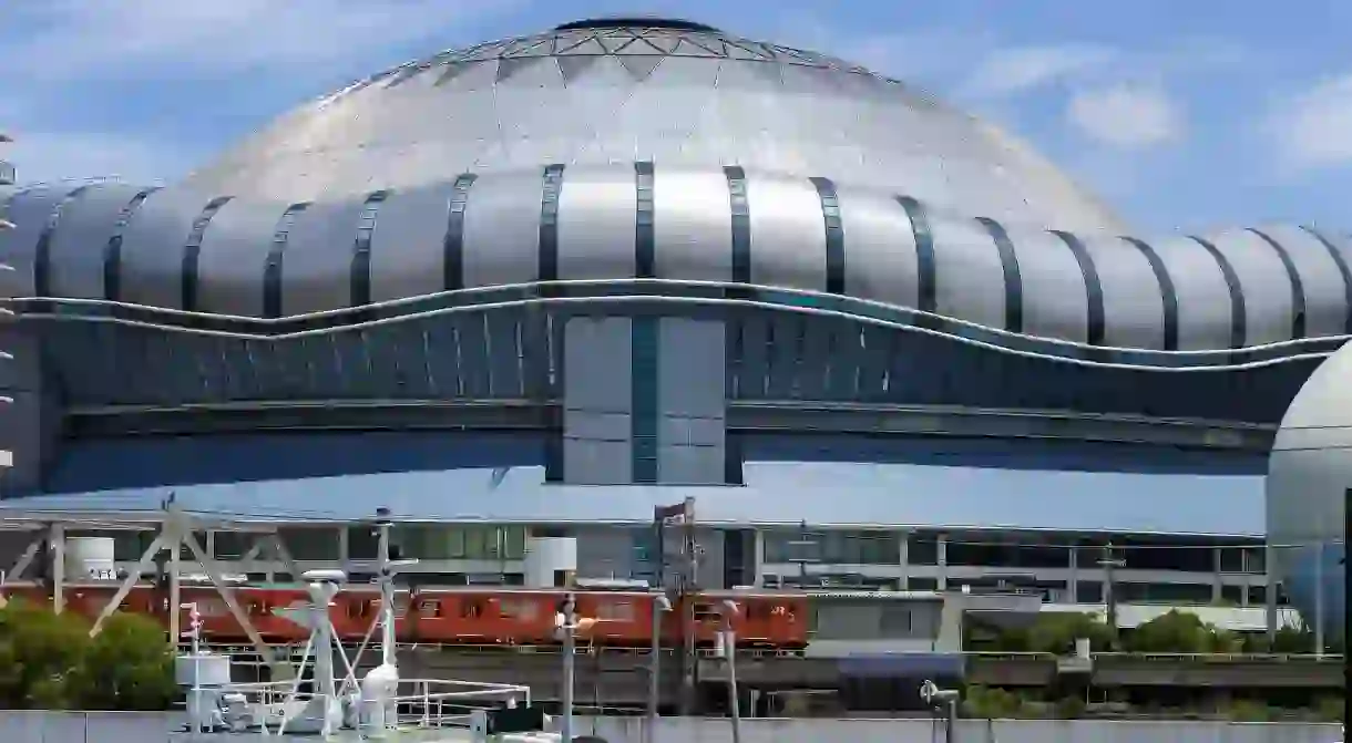 The Loop Line train passes the Kyocera Dome in Osaka.