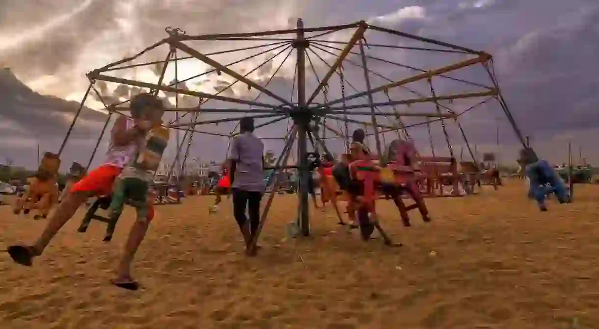 Children in Chennai enjoying a cloudy respite from the summer heat