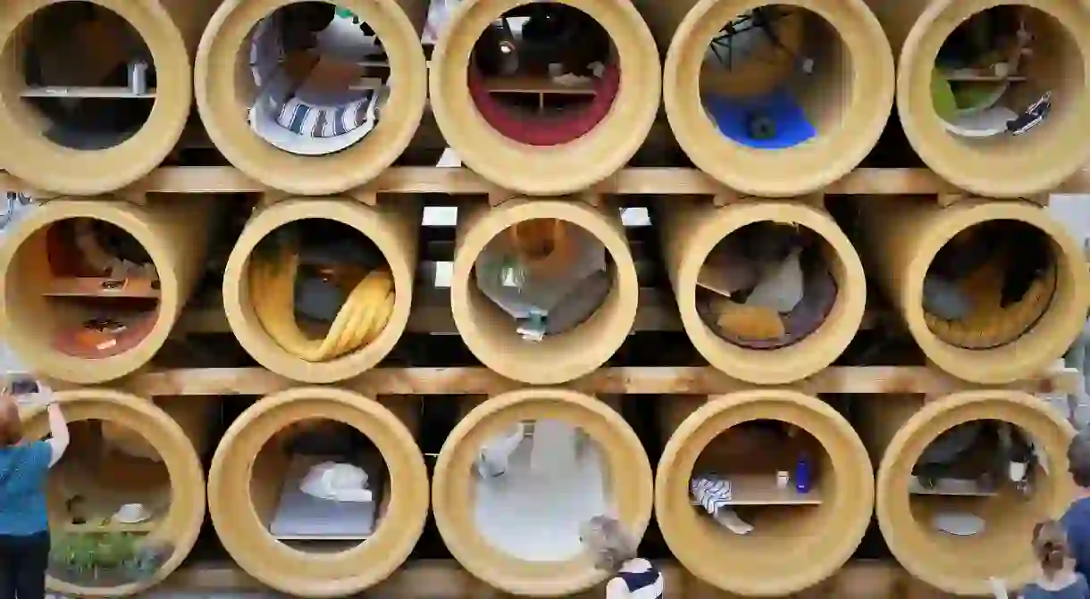 Refugee homes in tubes art installation