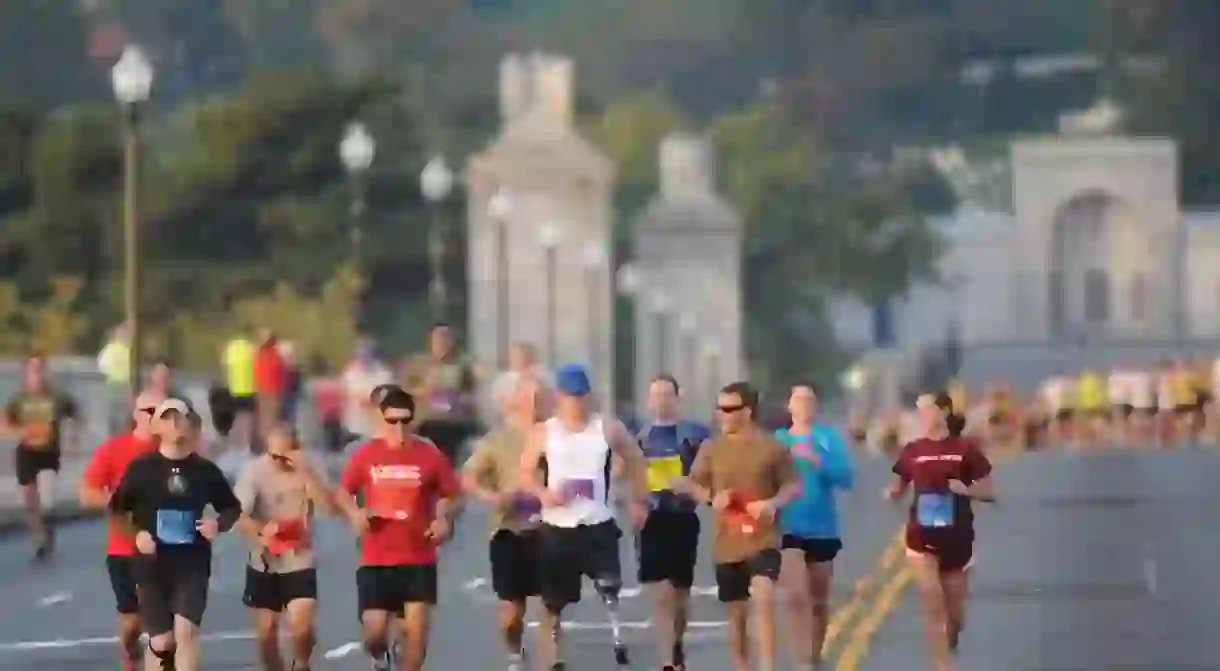 Runners cross Memorial Bridge at the Army 10 Miler