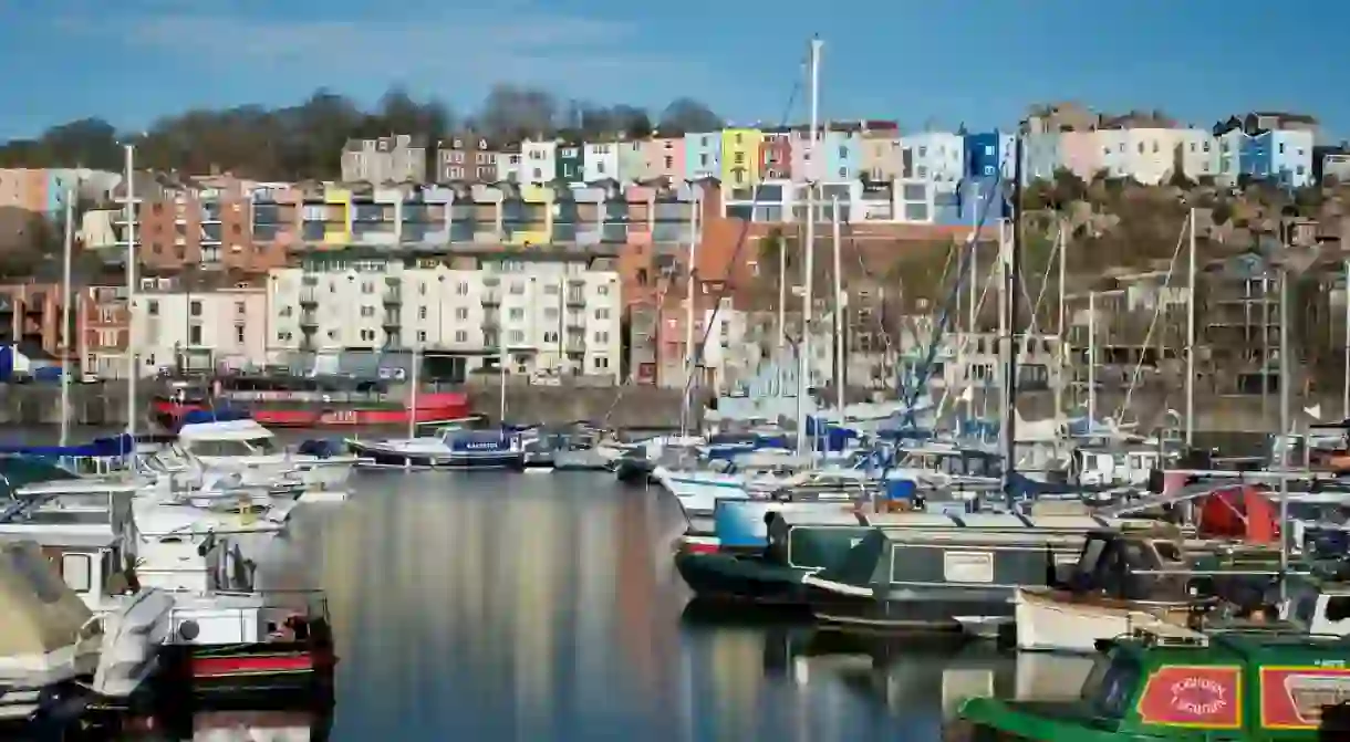 Colourful houses and boats line Bristols Marina