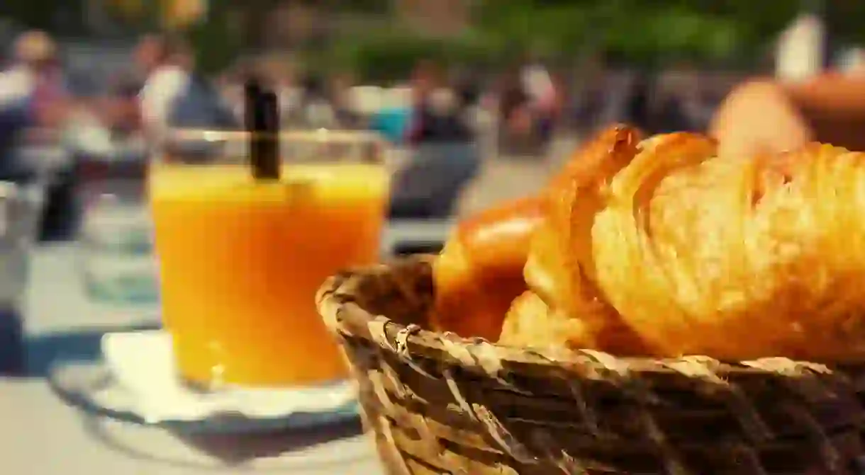 Freshly baked croissants and squeezed orange juice