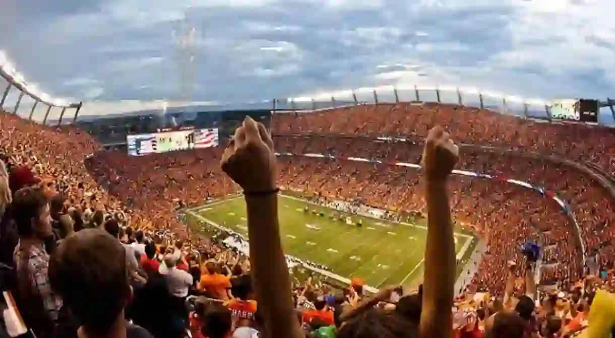 Denver Broncos fans cheer during a game