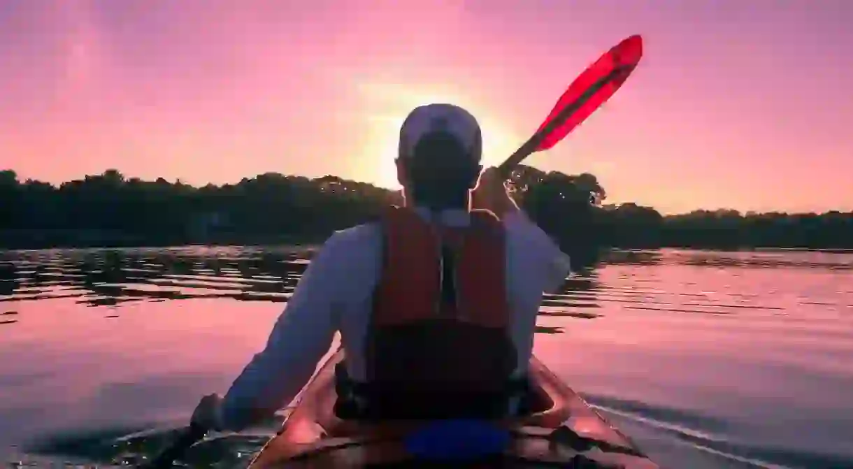 Kayaking at sunset.