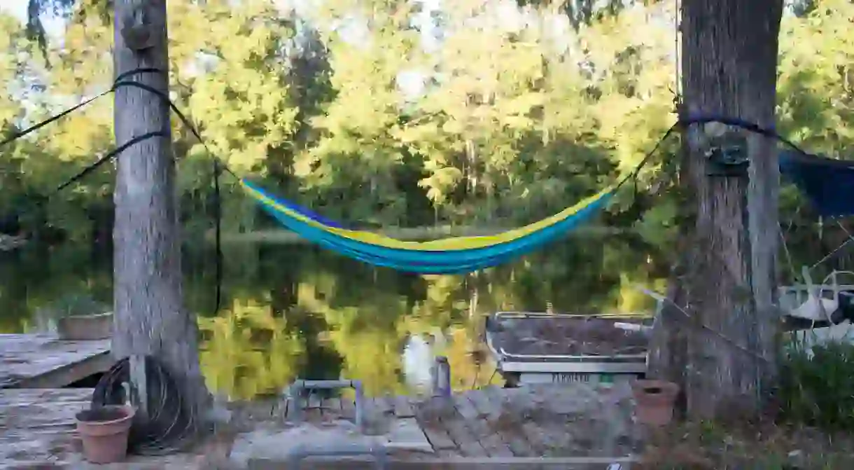 Blue hammock binded on a tree