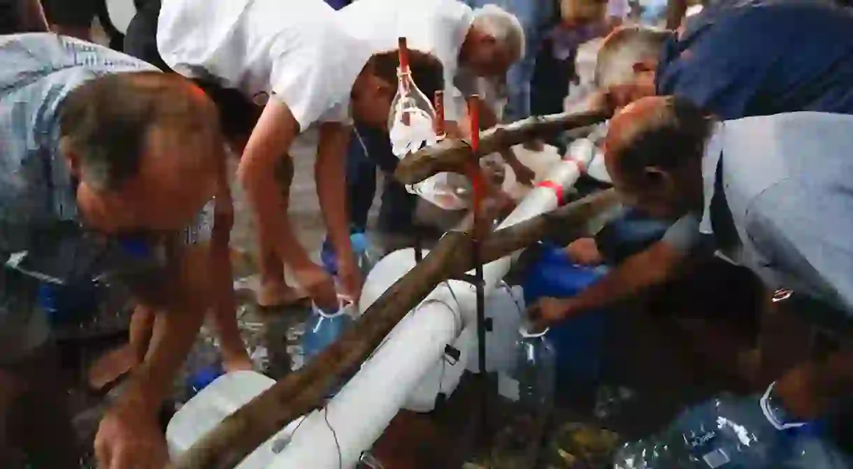 Cape Town residents collecting water