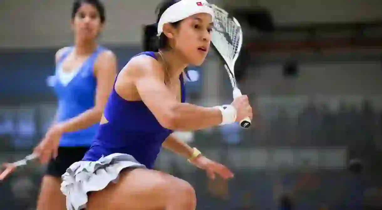 Nicol David (head band) defeats Joshna Chinappa