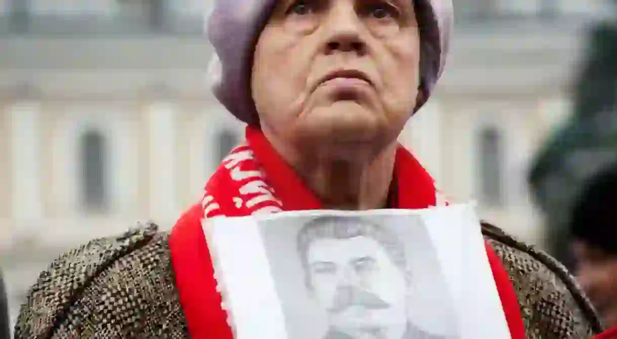 Woman takes part in the May Day Communist demonstration on May 1 in St. Petersburg, Russia