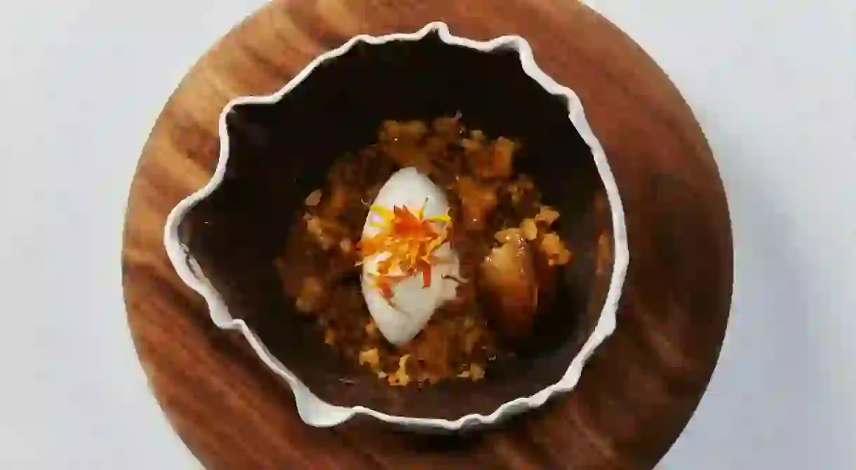 Chamomile ice cream, cardamom and brown butter sponge, and toasted sunflower seeds