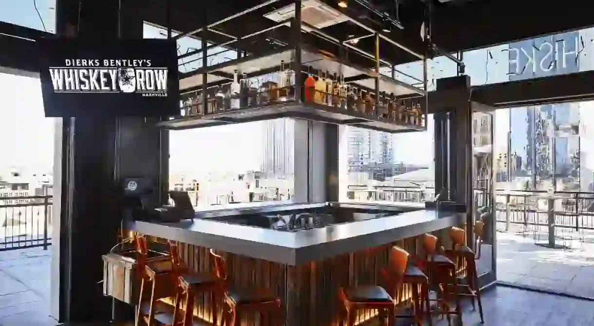 Whiskey Row has a full menu, a rooftop patio & a dance floor