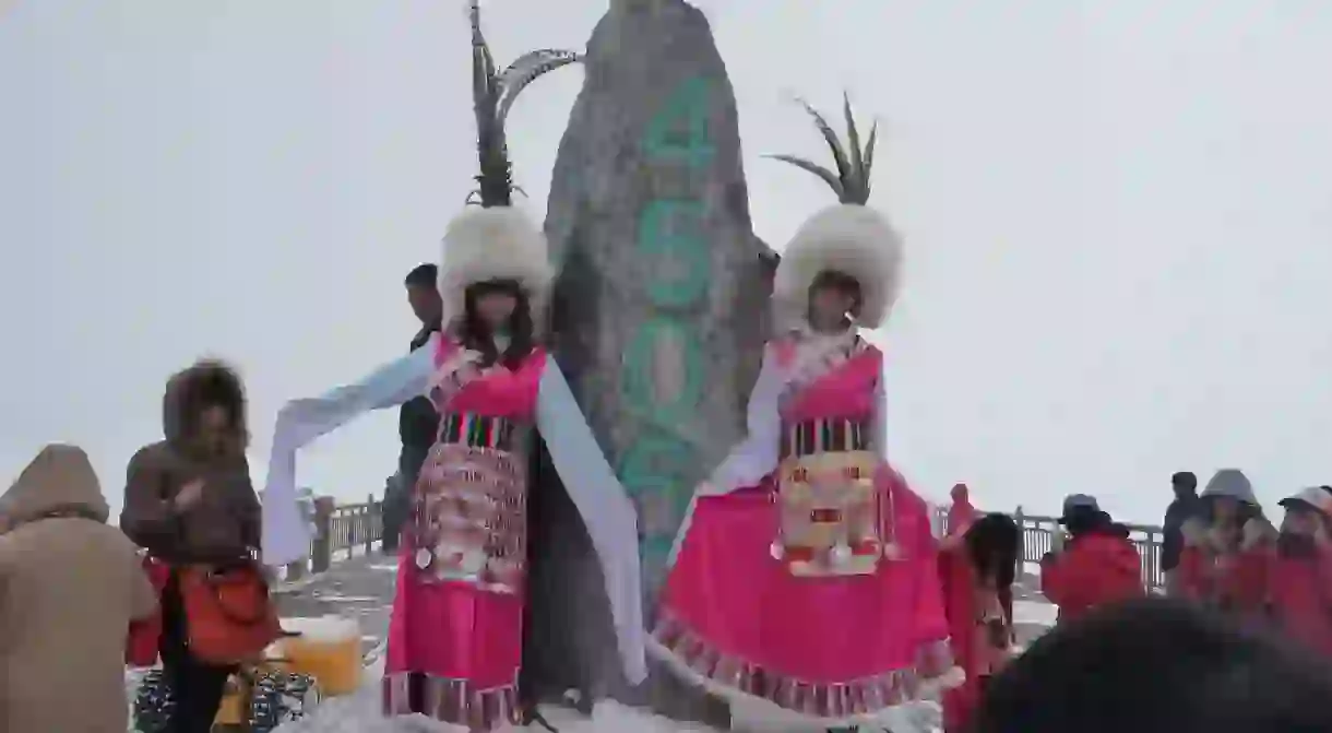 Tourists Dress in the Pumi Style