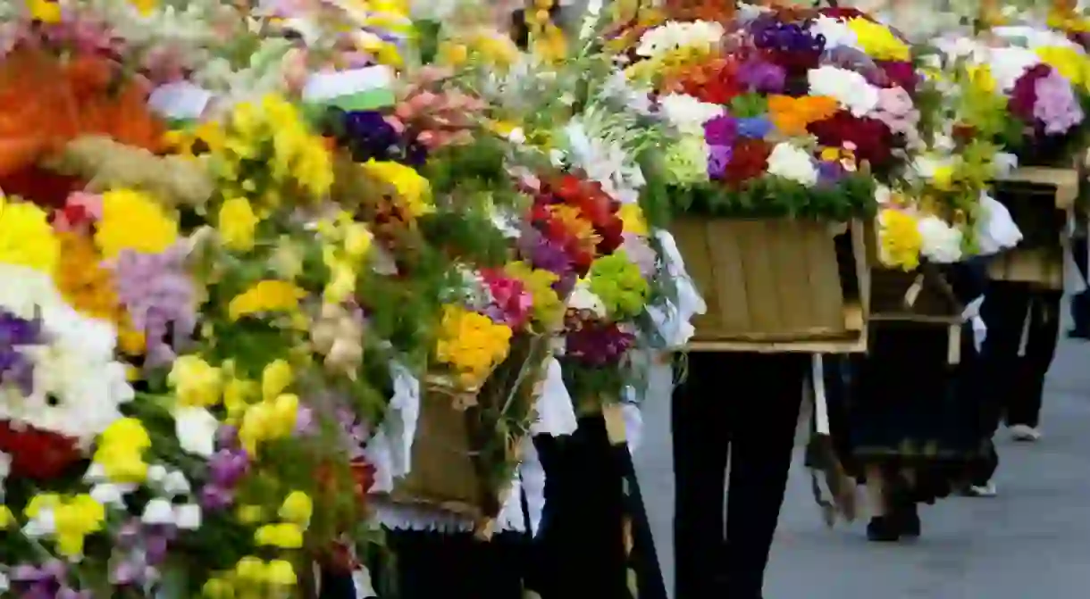 The festival finishes with a huge parade of farmers carrying beautiful flower arrangements