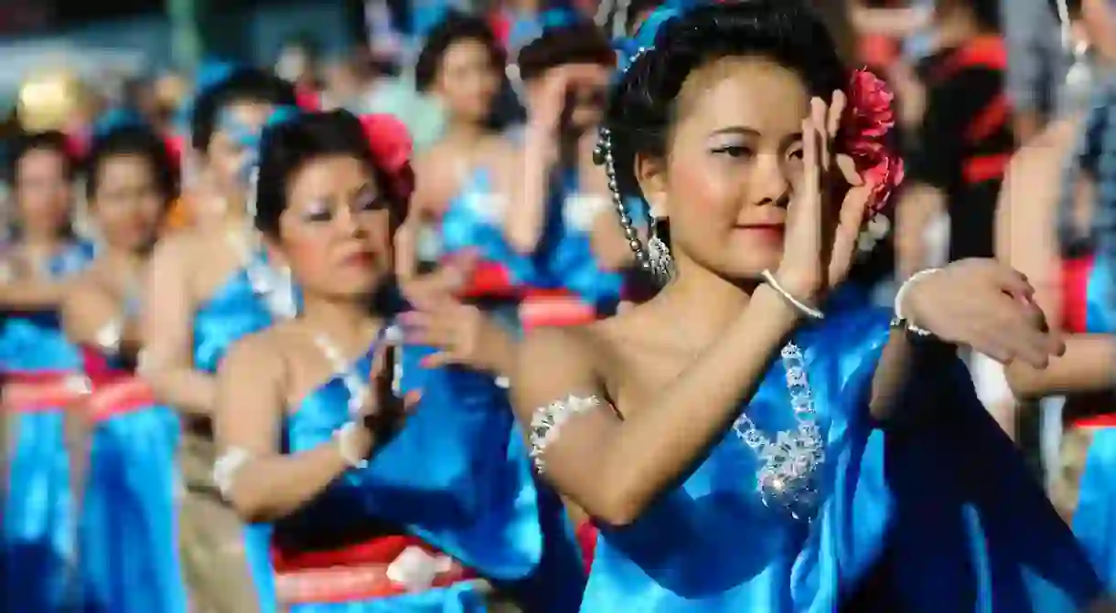 Group of Thai dancers in the street