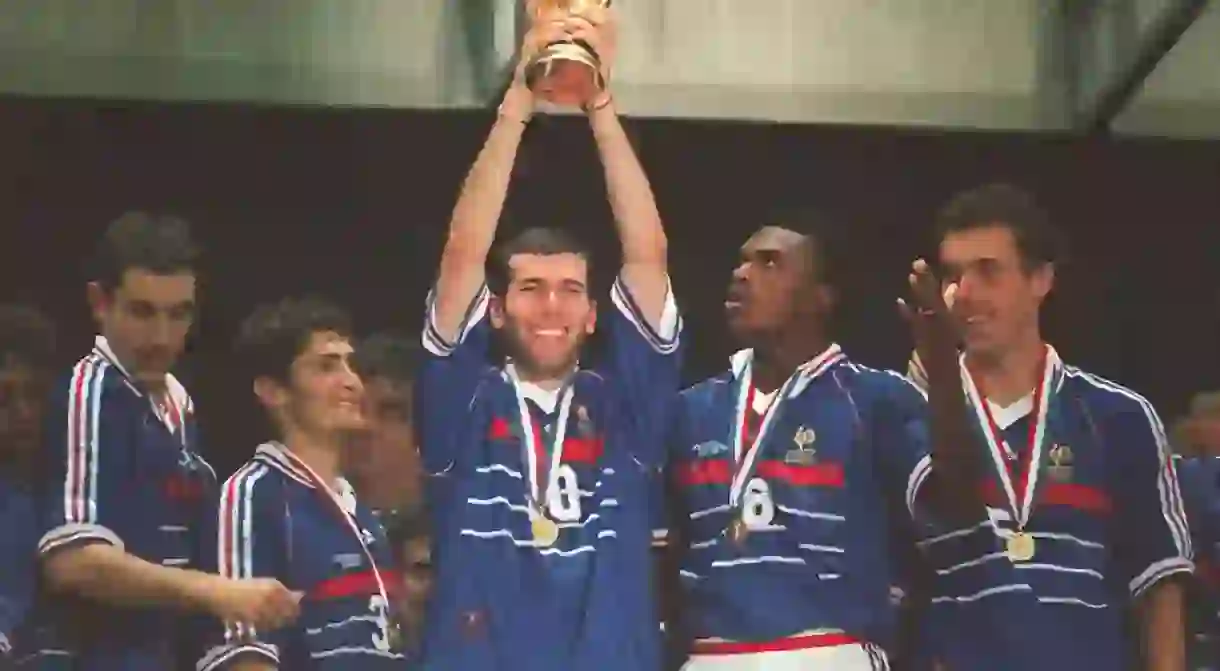 Frances Zinedine Zidane lifts the World Cup trophy in 1998