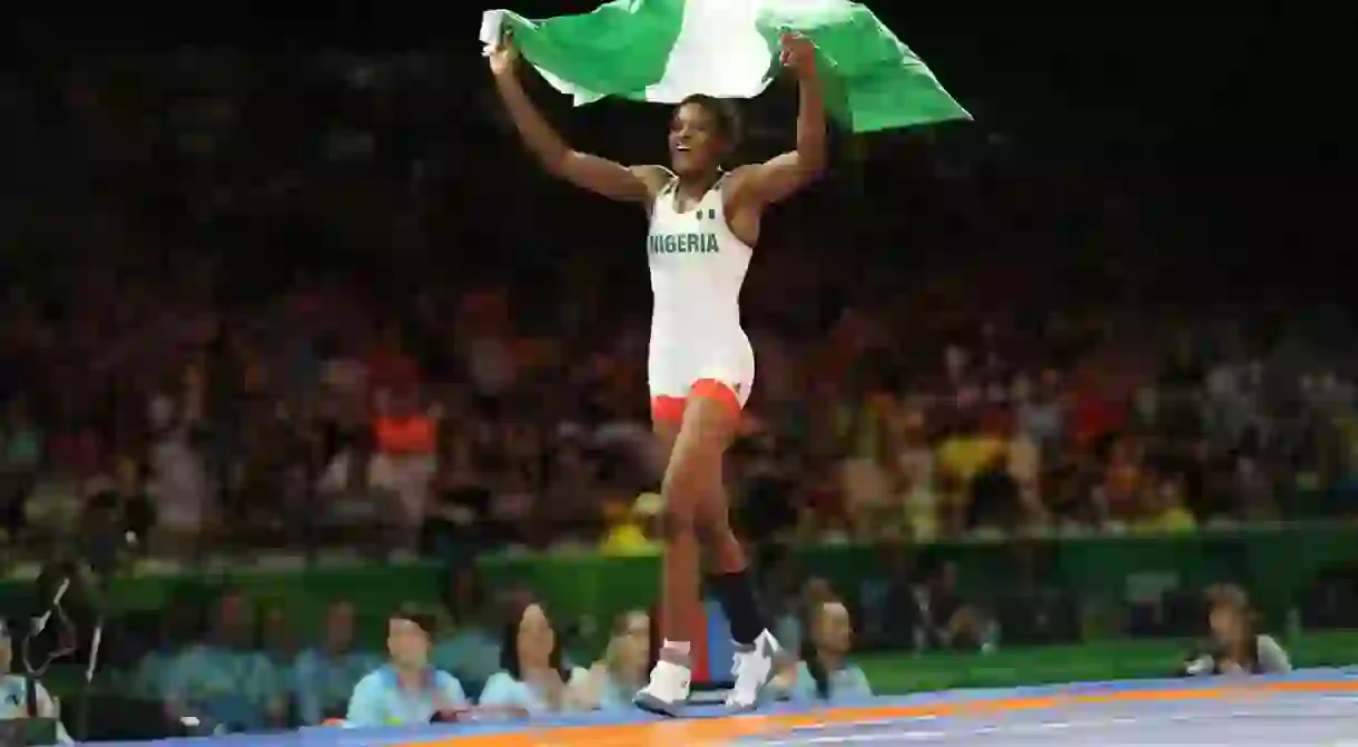 Odunayo Adekuoroye celebrates winning gold at the 2018 Commonwealth Games