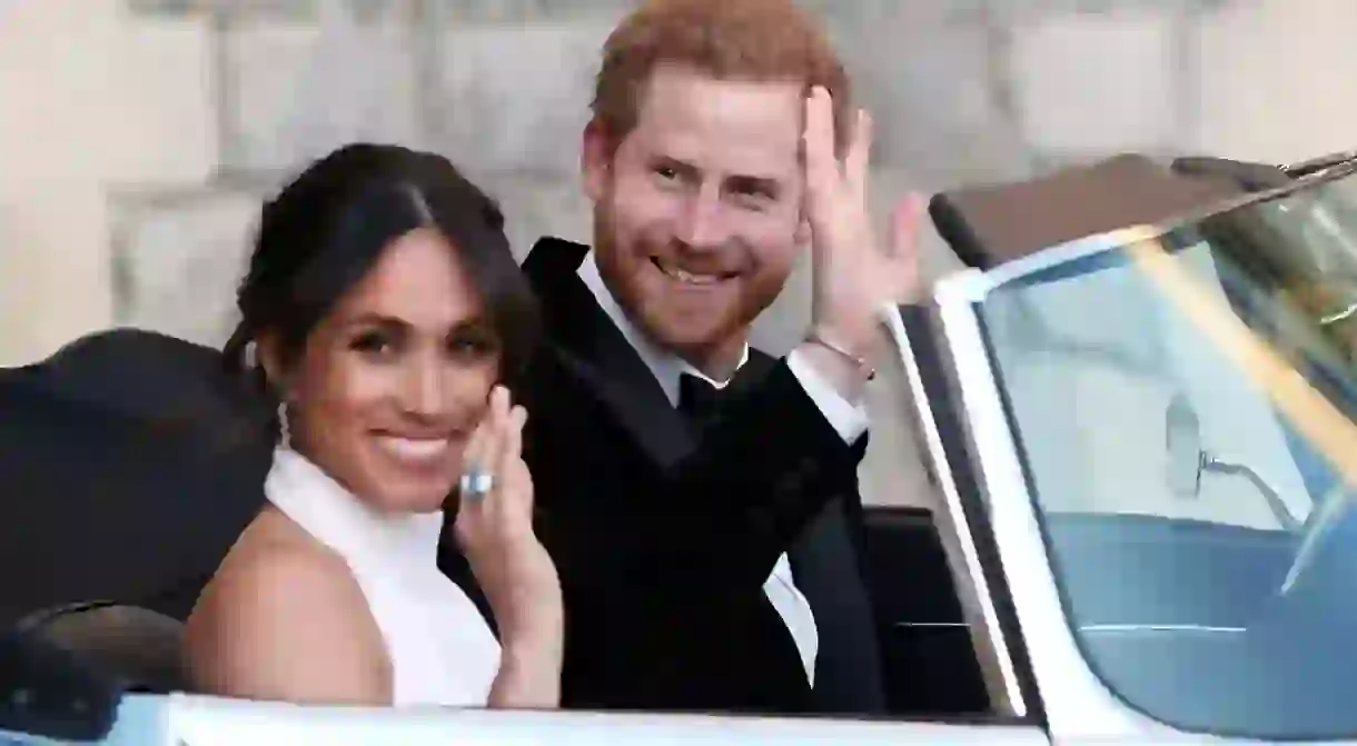 The newly married Duke and Duchess of Sussex, Meghan Markle and Prince Harry, leaving Windsor Castle after their wedding to attend an evening reception at Frogmore House The wedding of Prince Harry and Meghan Markle, Open-top car, Windsor, Berkshire, UK - 19 May 2018