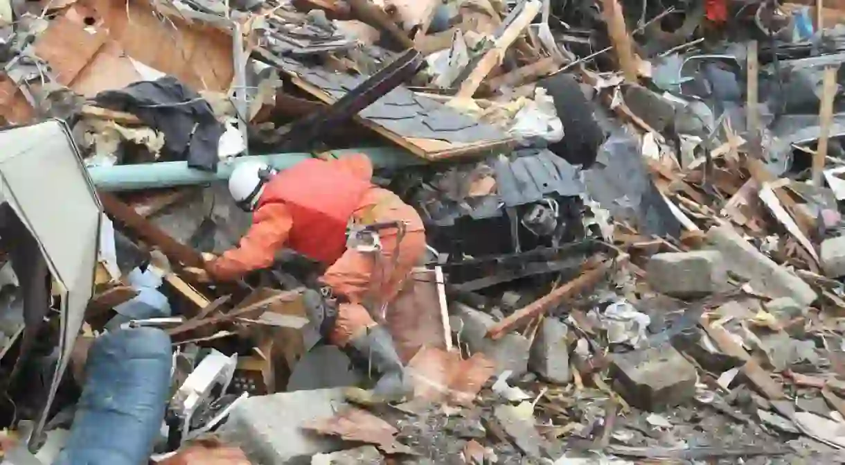 Rescue teams searching for missing people in Natori devastated by the 2011 quake.